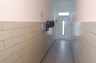 Mehrfamilienhaus kaufen in 66359 Bous, Renditeobjekt in Bous: Mehrfamilienhaus mit drei Gewerbeeinheiten und zusätzlichem Bauland