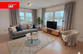 Wohnung kaufen in 64546 Mörfelden-Walldorf, Modernisierte 3-Zi.-Whg. im Dreifamilienhaus mit Balkon, Keller & Stellplatz, Feldrandlage Mörfelden