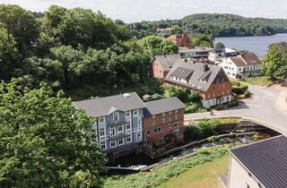 Wohnung kaufen in 23714 Malente, Kernsanierte Obergeschosswohnung in der historischen Gremsmühle an der Schwentine mit 2 Balkonen