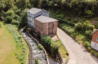 Wohnung kaufen in 23714 Malente, Kernsanierte Wohnung in der historischen Gremsmühle an der Schwentine