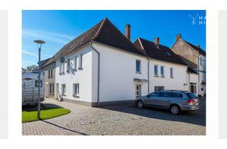 Mehrfamilienhaus kaufen in 39439 Güsten, Mehrfamilienhaus als lukratives Sanierungsobjekt.