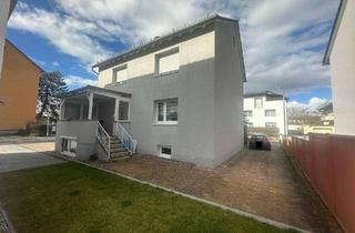 Haus kaufen in 65474 Bischofsheim, Modernes Wohnen im Zweifamilienhaus Komfort & Gemeinschaft vereint