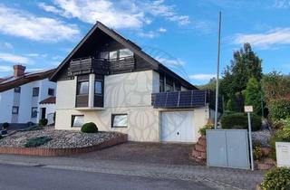 Haus kaufen in 56244 Ötzingen, Nähe Montabaur: Freistehendes Ein- bis Zweifamilienhaus mit schönem Garten und Garage