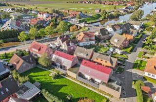 Grundstück zu kaufen in 26409 Wittmund, Provisionsfrei! Grundstück mit Baugenehmigung für ein Doppelhaus in Top Lage!