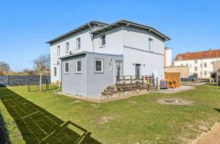 Einfamilienhaus kaufen in 17126 Jarmen, Charmantes Einfamilienhaus mit kleiner Gewerbeeinheit auf ca. 1.094 m² Eigengrundstück in Jarmen