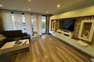 Reihenhaus kaufen in 33378 Rheda-Wiedenbrück, Modernisiertes Reihenhaus mit Garten, Sauna und Garage in ruhiger Rheda-Lage. Ein ideales Zuhause!