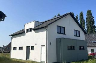Haus kaufen in 49324 Melle, Erstbezug! Moderne Maisonette mit Gartenanteil, 3–4 Zimmer & Top-Energiekonzept