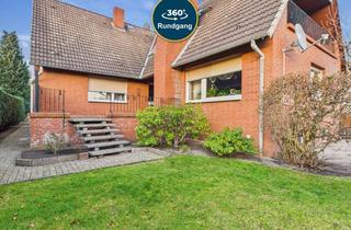 Haus kaufen in 30900 Wedemark, Großzügiges Zweifamilienhaus mit Traumgarten - Freistehend und erstklassig gepflegt!