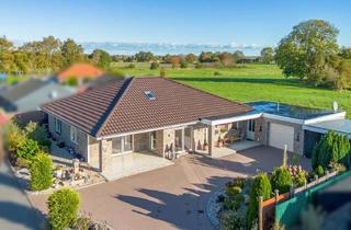 Haus kaufen in 26427 Holtgast, Holtgast (OT Utgast): Neuwertiger Bungalow mit Blick ins Grüne in Küstennähe!