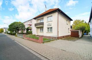 Einfamilienhaus kaufen in 35423 Lich, Einfamilienhaus mit viel Potenzial, großem Garten, Garage & Kamin in ruhiger Lage von Lich