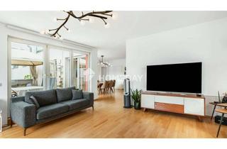 Wohnung kaufen in 97250 Erlabrunn, Rückzugsort mit Freiraum: 5-Zimmer-Wohnung mit Garten und Garage