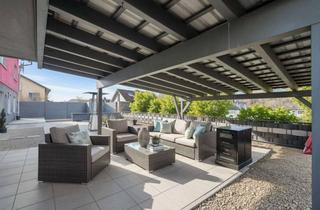 Wohnung kaufen in 79650 Schopfheim, Moderne EG-Wohnung mit grosser Terrasse und Teich