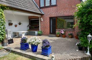 Haus kaufen in 22946 Grande, Charmantes Rotklinkerhaus mit Einliegerwohnung und großem Garten