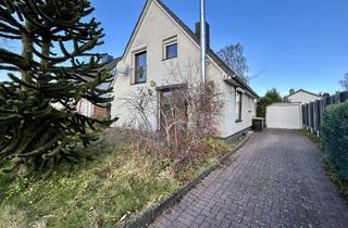 Einfamilienhaus kaufen in 24620 Bönebüttel, Gemütliches Einfamilienhaus mit Garage und Teich