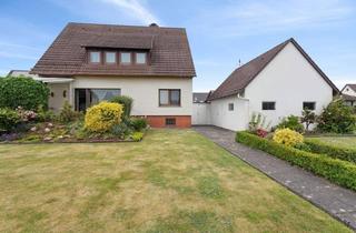 Haus kaufen in 31737 Rinteln, Familienfreundliches Zweifamilienhaus mit Gartenparadies – ideal für Freunde oder Generationen