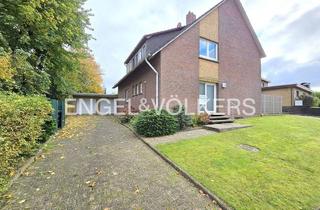 Haus kaufen in 26441 Jever, Gepflegtes Zweifamilienhaus in Jever: Solide Kapitalanlage