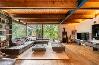 Haus kaufen in 82194 Gröbenzell, AIGNER - Charmanter Bungalow im Mid-Century-Stil mit uneinsehbarem Grundstück