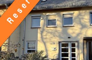 Reihenhaus kaufen in 27313 Dörverden, Dörverden-Barme: Familientaugliches Reihenhaus mit Keller, Garage, Gartenhaus und Wohlfühlatmosphäre