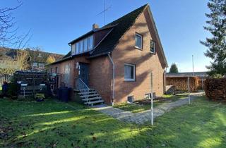 Haus kaufen in 27449 Kutenholz, Wohnhaus mit Potenzial!Zwei Wohneinheiten, Vollkeller und Garage