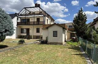 Haus kaufen in 61184 Karben, Karben - Großzügiges Mehrgenerationenhaus mit weitläufigem Garten und Garage!