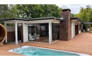 Einfamilienhaus kaufen in 26180 Rastede, Rastede - Einfamilienhaus mit Privatsee und Pferdestall in Rastede