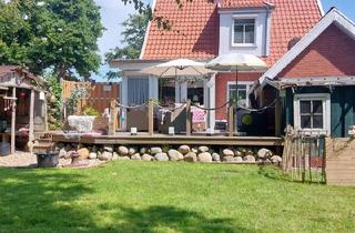 Einfamilienhaus kaufen in 26759 Hinte, Hinte - Modernisiertes Einfamilienhaus mit großem Garten in ruhiger Lage