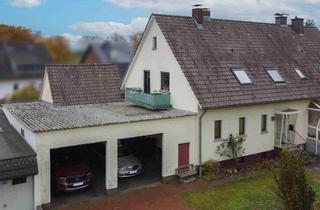 Doppelhaushälfte kaufen in 32469 Petershagen, Ihr neues Zuhause: Doppelhaushälfte mit Garten und Doppelgarage in Petershagen-Friedewalde