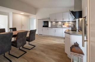 Wohnung kaufen in 25813 Husum, Moderne 3-Zimmer-Eigentumswohnung mit viel Charme und tollem Blick auf den Husumer Schlosspark.