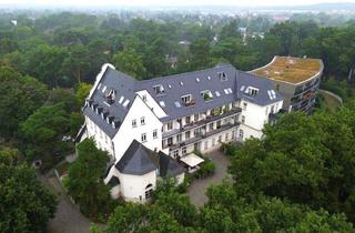 Wohnung kaufen in 12683 Berlin, Berlin - Historischer Charme trifft modernes Wohnen - Exklusive 2-Zimmer-DG-Wohnung in Berlin-Biesdorf