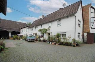 Mehrfamilienhaus kaufen in 65835 Liederbach, Liederbach am Taunus - Vielseitiges Mehrfamilienhaus mit Scheune & 6 Garagen in ruhiger Sackgasse von Liederbach