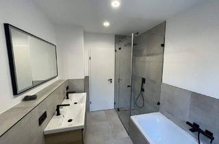 Wohnung kaufen in 91074 Herzogenaurach, Herzogenaurach - Hochwertige, energetisch sanierte 5-Zimmer-EG-Wohnung mit Balkon, Garten u. 2 Garagenstellplätzen