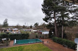 Wohnung kaufen in 64319 Pfungstadt, Helle 3,5-Zimmer Wohnung mit Balkon im 1. OG in und Blick ins Grüne