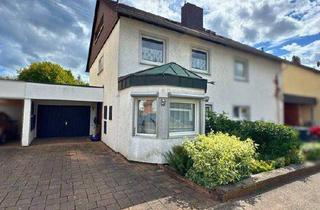 Einfamilienhaus kaufen in Parallelstraße 62, 66127 Saarbrücken, Saarbrücken / Klarenthal - Einfamilienhaus mit Wintergarten, Garage + parkähnlichem Garten