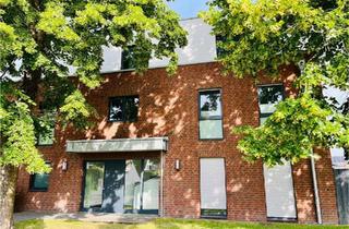 Wohnung kaufen in 47495 Rheinberg, Rheinberg - Moderne Erdgeschosswohung mit Garage und Garten