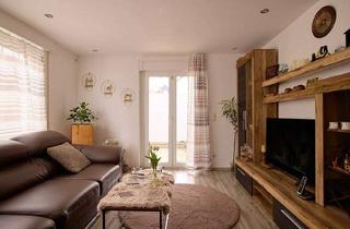 Wohnung kaufen in 71409 Schwaikheim, Modernisierte 3-Zimmer-Wohnung mit Garten, Garage und Wohlfühlatmosphäre