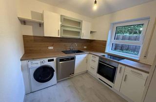 Wohnung kaufen in 91325 Adelsdorf, Neuwertige 60 m² Souterrain Wohnung in Aisch, KFZ- Stellplätze, Gartenanteil, perfekt für Junggesel