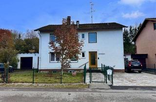 Wohnung kaufen in 83342 Tacherting, Gemütliche Wohnung mit Gartenidylle - Wohnen im Zweifamilienhaus