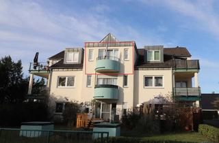 Wohnung kaufen in 53859 Niederkassel, Charmantes Dachgeschossappartement mit Balkon und Tiefgaragenstellplatz in Niederkassel