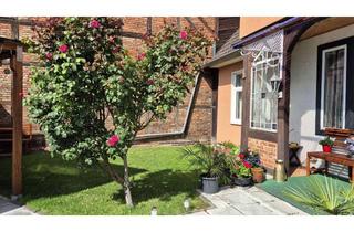 Wohnung kaufen in 31311 Uetze, Vermietete Erdgeschosswohnung mit Garten im Herzen von Uetze