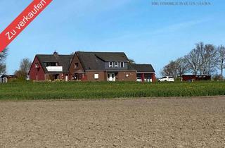 Mehrfamilienhaus kaufen in 26409 Wittmund, Seltene Gelegenheit - Mehrfamilienhaus mit PV-Anlage in wunderschöner Lage zu verkaufen!