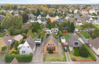 Einfamilienhaus kaufen in 24536 Tungendorf, Doppelte Mieteinnahmen – Ensemble mit Einfamilienhaus und Bungalow im beliebten Tungendorf