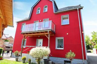 Haus kaufen in 06317 Erdeborn, Vollvermietetes und saniertes MFH