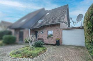 Doppelhaushälfte kaufen in 40789 Monheim, Charmante Doppelhaushälfte mit zwei separaten Wohneinheiten in ruhiger Spielstraßenlage von Baumberg