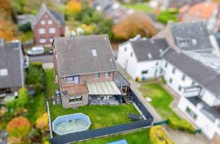 Anlageobjekt in 41366 Schwalmtal, Gepflegtes Einfamilienhaus mit 54 qm Gewerbeeinheit und 57 qm ausgebaute Nutzfläche in Waldniel