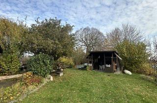 Mehrfamilienhaus kaufen in 24220 Flintbek, Vielseitige Immobilie: Dreifamilienhaus im Herzen von Flintbek