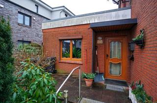 Wohnung kaufen in 23611 Bad Schwartau, Vermietete Erdgeschosswohnung mit Garten und Sanierungsbedarf