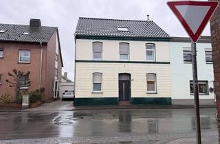 Doppelhaushälfte kaufen in 47533 Kleve, Geräumige Doppelhaushälfte mit begonnenen Sanierungsarbeiten in Kleve-Griethausen