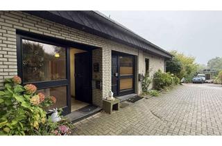 Haus kaufen in 49186 Bad Iburg, Doppelhaus mit neuer Photovoltaik, Einliegerwohnung & Gartenparadies in Bad Iburg (Caport, Kamin.)