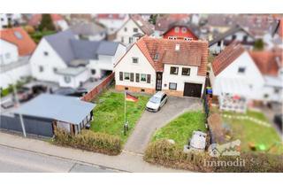 Haus kaufen in 61191 Rosbach, Charmantes Zweifamilienhaus mit großem Grundstück und vielseitigen Nutzungsmöglichkeiten