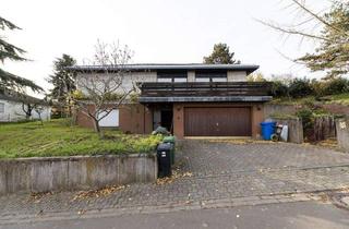 Haus kaufen in Anemonenweg 14, 67278 Bockenheim, Bockenheim an der Weinstraße - Winkelbungalow auf sonnigem Grundstück mit viel Potenzial zur individuellen Renovierung